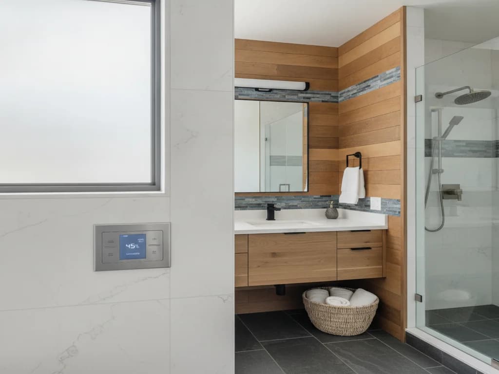 Wall control for a humidity-sensing bathroom exhaust fan